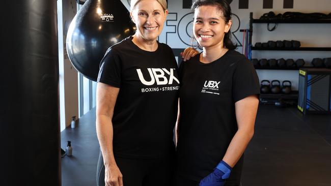 Owner Clare Mitchell with a gym member, UBX Graceville. Picture: Liam Kidston