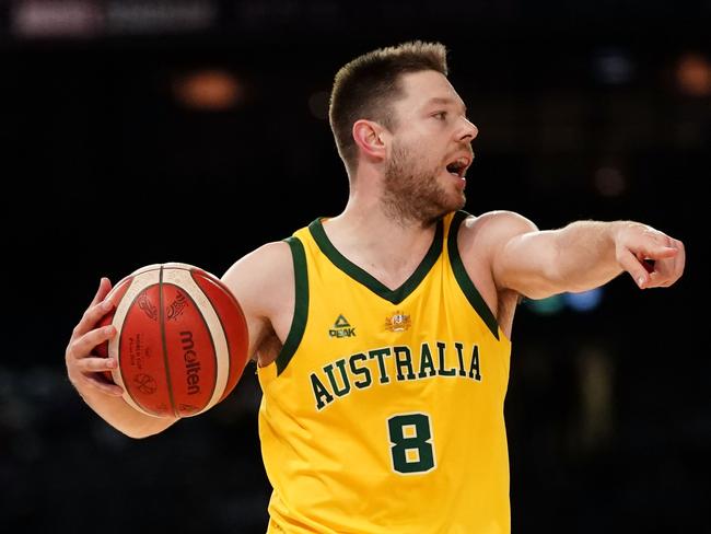 Matthew Dellavedova of Australia controls the ball during match 2 of the Pre-FIBA World Cup series between Australia and the USA  at Marvel Stadium in Melbourne, Saturday, August 24, 2019.  (AAP Image/Scott Barbour) NO ARCHIVING, EDITORIAL USE ONLY