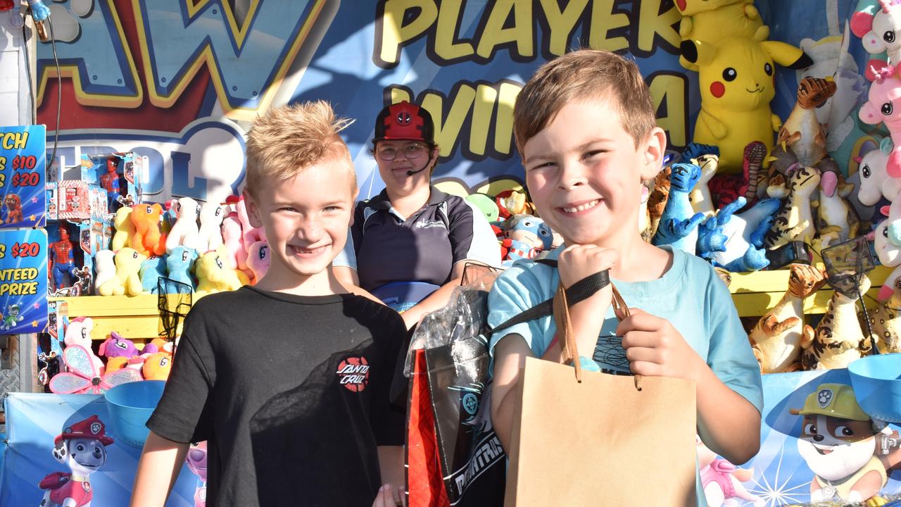 Jack Ryan and Oakley Abel of Cannonvale were very happy with their monster truck showbags. Picture: Kirra Grimes