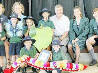 Reef Guardians (front, from left) Hein Kuyler and Jack Hickey, (middle row) Tegan White, Isabelle Roberts, Alexi Schoeman, Charlotte Green, Senator John Hogg, Charlotte Kelly, Vincent Nydam, (back) Rhianna Rickard and Megan Sperring.