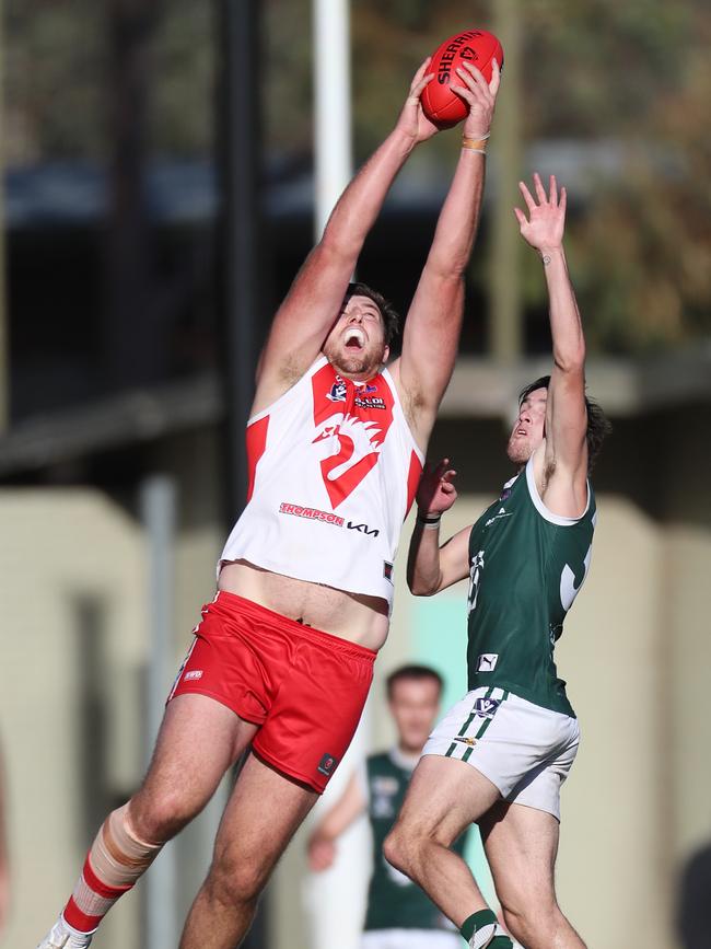 Shepparton Swans ruckman Mark Kovacevic marks strongly in front of Echuca’s Jack Evans.