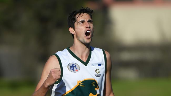 Ash Close of Northcote Park reacts after kicking a goal during the NFL footy match held at Bill Lawry Oval in Northcote, Melbourne, Saturday, July 14, 2018. Northcote Park v Whittlesea. (AAP Image/James Ross) NO ARCHIVING