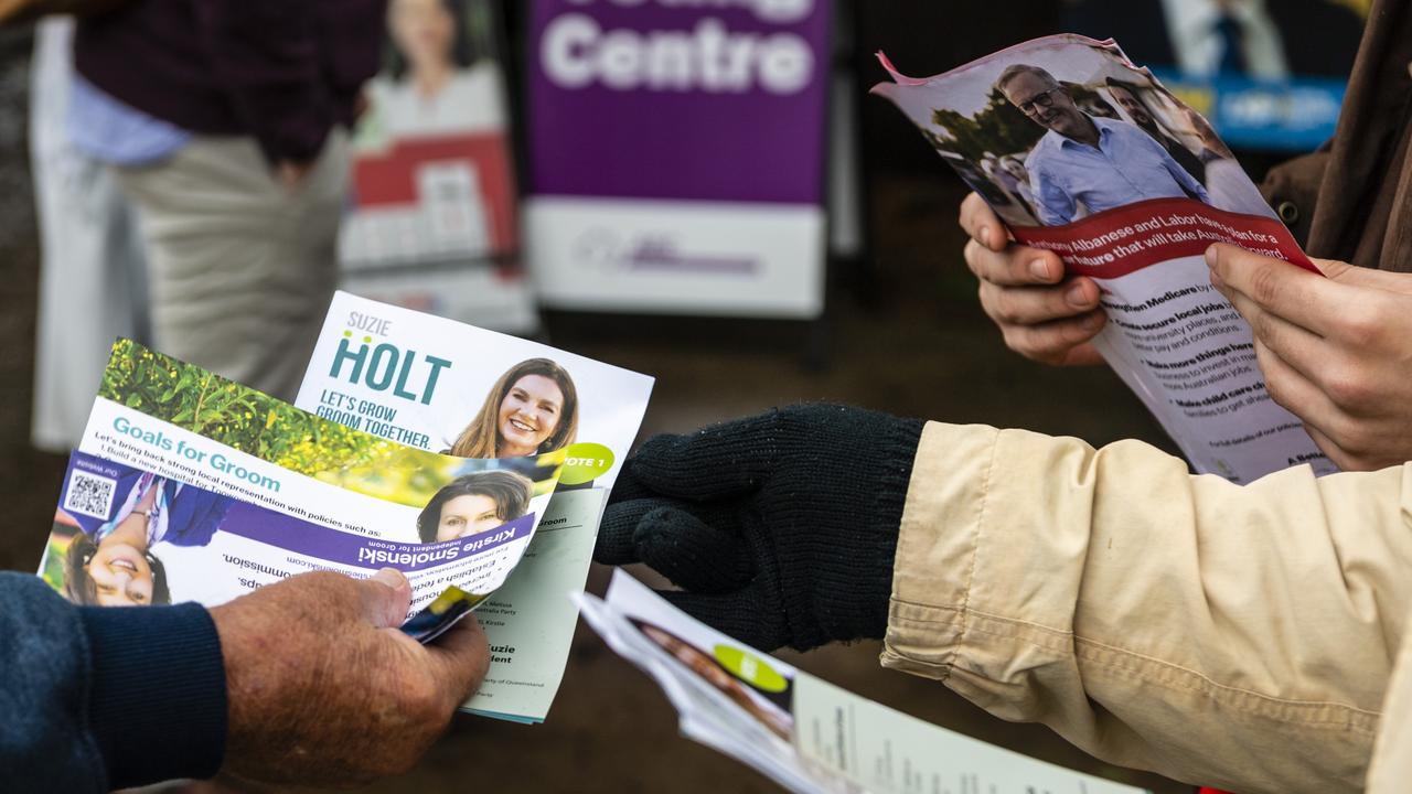 How to vote pamphlets for Groom candidates being handed out at a pre-poll booth. Picture: Kevin Farmer