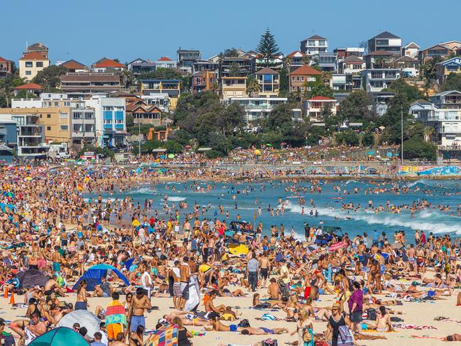 Very crowded but immensely popular Bondi Beach in Sydney. Thousands of sun lovers will gather here to swim and surf on any sunny day, tourists and locals alike.Escape 16 April 2023Why I travelPhoto - iStock