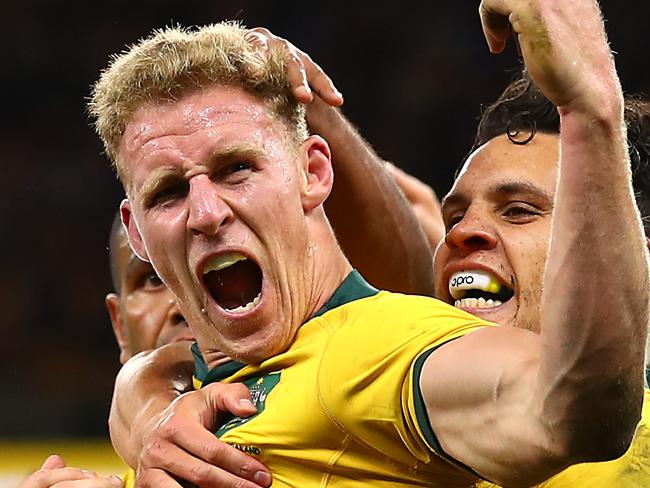 PERTH, AUSTRALIA - AUGUST 10: Reece Hodge of Australia (C) celebrates his try during the 2019 Rugby Championship Test Match between the Australian Wallabies and the New Zealand All Blacks at Optus Stadium on August 10, 2019 in Perth, Australia. (Photo by Cameron Spencer/Getty Images)