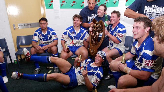 Sonny Bill Williams celebrates with the Bulldogs after winning the 2004 NRL grand final against the Roosters.