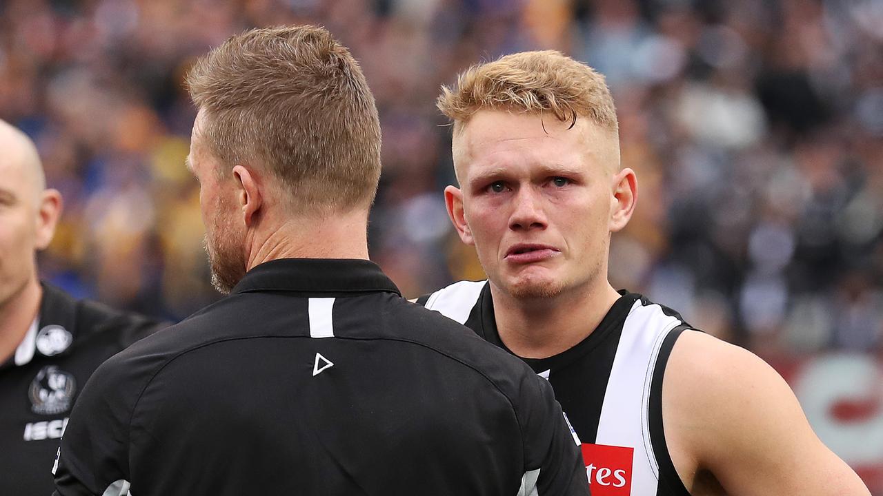 Dejected Adam Treloar and Collingwood coach Nathan Buckley after losing to the West Coast Eagles in the 2018 AFL Grand Final at the MCG. Picture. Phil Hillyard