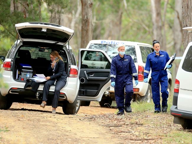 Police near where a woman’s body has been found at Mt Macedon. Picture: Mark Stewart