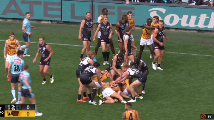 Tempers spilled over early in the clash between Hawthorn and Yartapuulti.