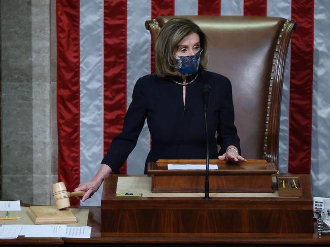 Speaker of the House Nancy Pelosi raps her gavel after the House voted to impeach President Donald Trump for the second time. Picture: AFP