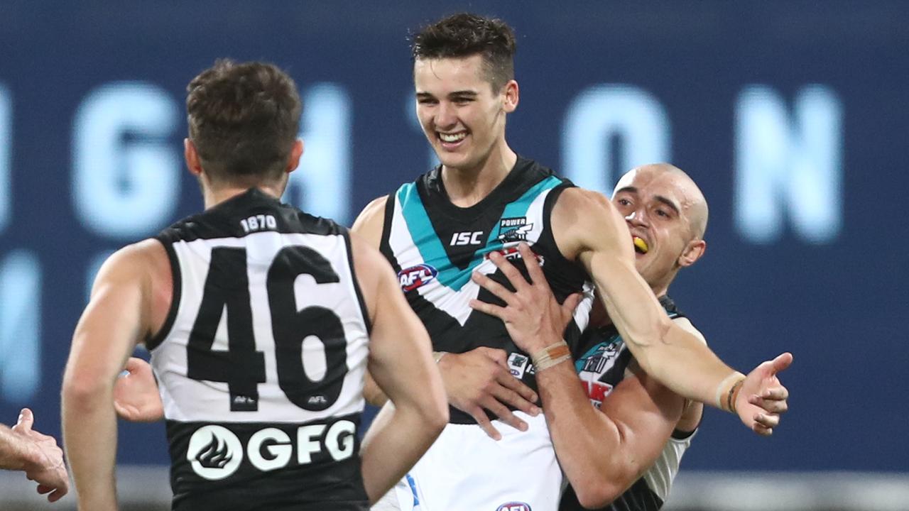 Connor Rozee of the Power celebrates a goal against the Lions at The Gabba. Picture: Getty Images