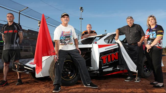 Drivers Shaun Davoodi (from left), Alan Day, track steward Wayne Baines, speedway official Lance Wilson and driver Ash Dawes were shocked to hear of the Metro plans. Picture: Jonathan Ng