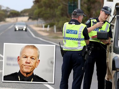 South Australian police officers check travellers coming from Victoria earlier this year. Inset: SA Police Commissioner Grant Stevens.