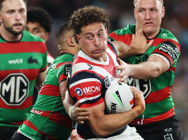 SYDNEY, AUSTRALIA - SEPTEMBER 06:  Mark Nawaqanitawase of the Roosters is tackled during the round 27 NRL match between South Sydney Rabbitohs and Sydney Roosters at Accor Stadium, on September 06, 2024, in Sydney, Australia. (Photo by Matt King/Getty Images)