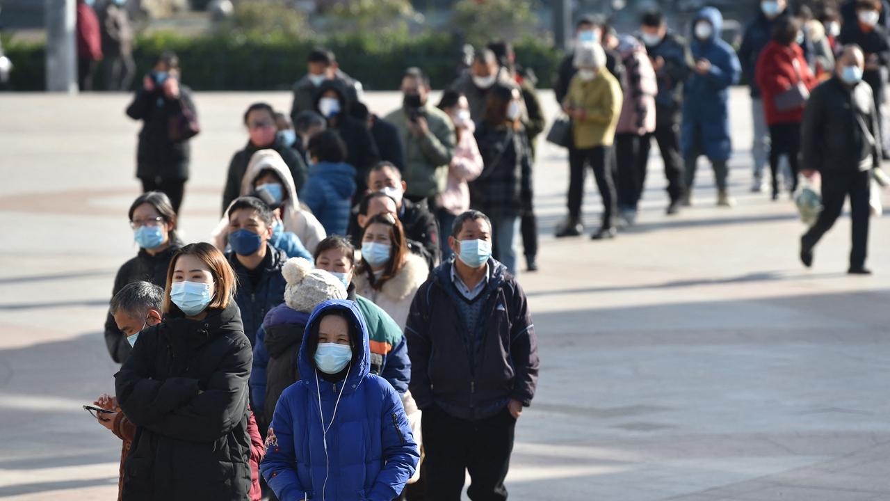 People queue to buy rapid antigen tests in Nanjing, in China's eastern Jiangsu province. Picture: AFP