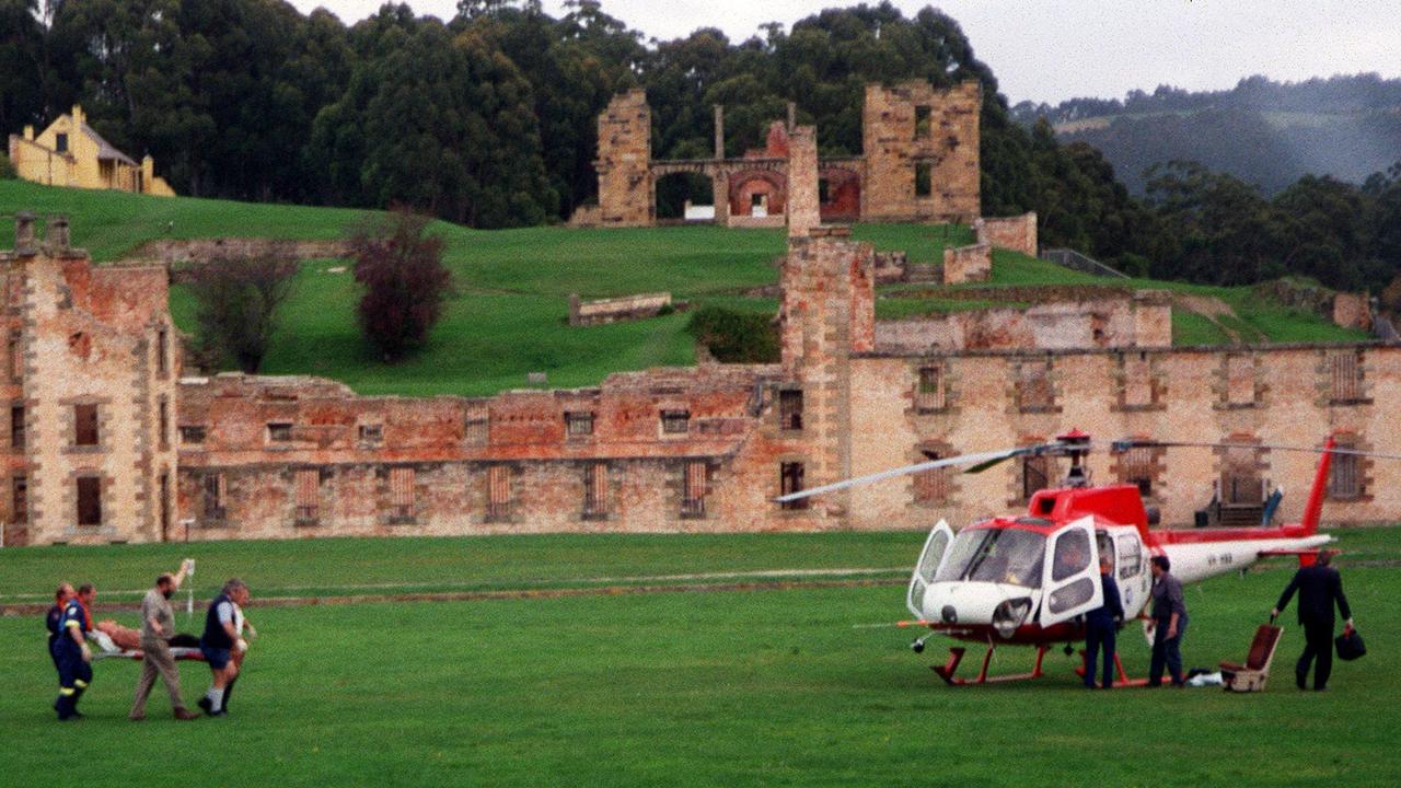 Massacre. A readers film shows a victim being carried to a helicopter in Port Arthur. 28 Apr 1996 crime tas murder shooting victims scene