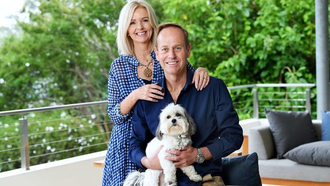 Mike Smithson and his wife Fiona with their dog at their Glen Osmond home. Picture Mark Brake