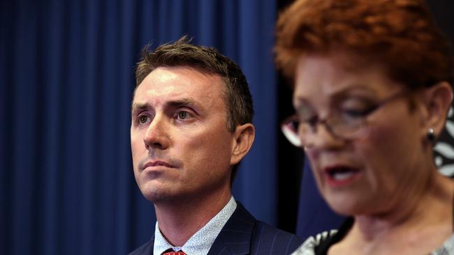 Senator Hanson and James Ashby at a media conference in Brisbane. Picture: AAP Image/Dan Peled