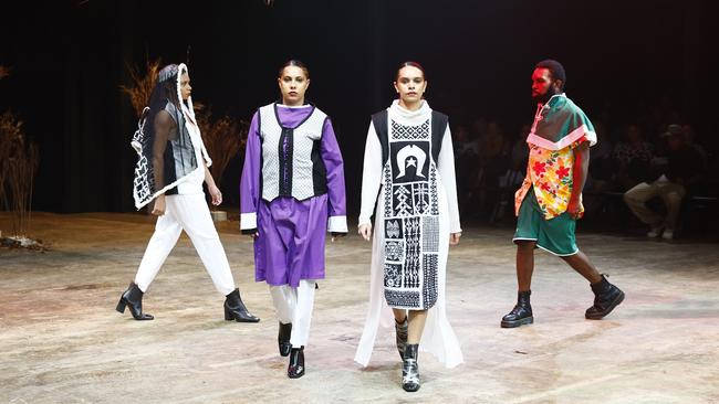 Models wear the MaSung collection by designer Robert Pau at the Cairns Indigenous Art Fair fashion performance, Woven, held at the Tanks Arts Centre, Edge Hill. Picture: Brendan Radke