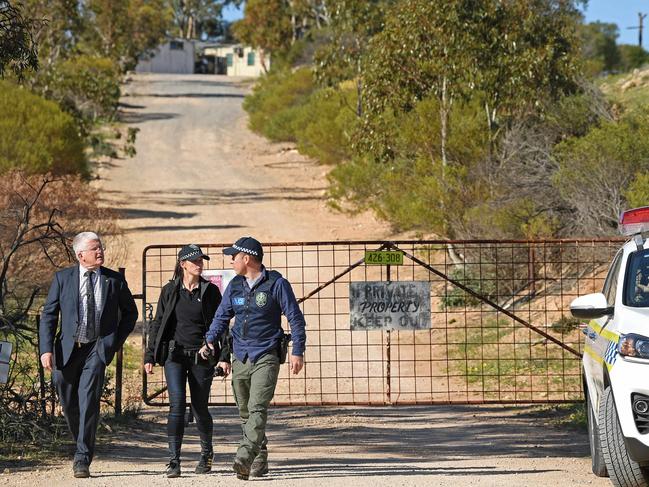 Detectives at the front of the Hells Angels’ Ponde property in SA’s Murray Mallee region, during a search in 2019 over two murders. Picture: Tom Huntley