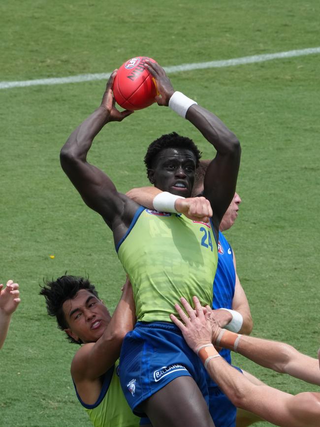 Buku Khamis takes a strong mark during the Dogs' match simulation in Maroochydore