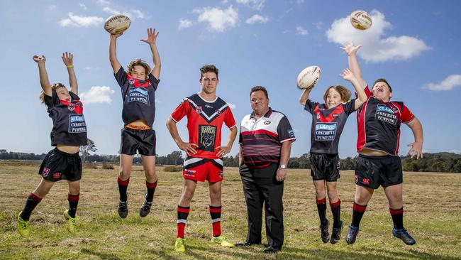 Mudgeeraba Redbacks juniors Miller Raven, Cooper Raven, Vann Raven and Brodie Simmons with 2018 senior captain Kyle Williams and committee member Pieter Berkhout. Picture: Jerad Williams