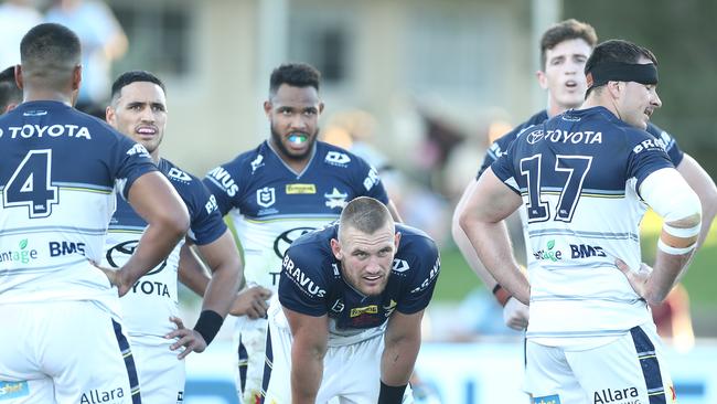 SYDNEY, AUSTRALIA - APRIL 03: Cowboys players look dejected after conceding a try during the round four NRL match between the Cronulla Sharks and the North Queensland Cowboys at Netstrata Jubilee Stadium, on April 03, 2021, in Sydney, Australia. (Photo by Mark Metcalfe/Getty Images)