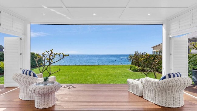 Ocean view deck opens up to the living room.