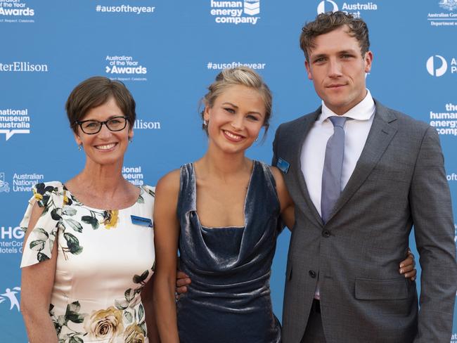 Grace Tame with mum Penny Plaschke and partner Maxim Heerey at the The 2021 Australian of the Year Awards ceremony in Canberra. Picture: NCA NewsWire / Martin Ollman