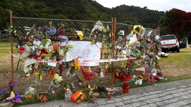 Tributes to victims at the gate near the Whakatane Wharf where White Island tour boats departed from. Picture: John Borren