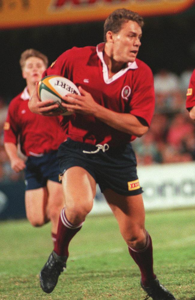 Jason Little (ball) during Queensland Reds v NSW Waratahs Super 12 RU game at Ballymore, 13/04/96. Rugby Union A/CT