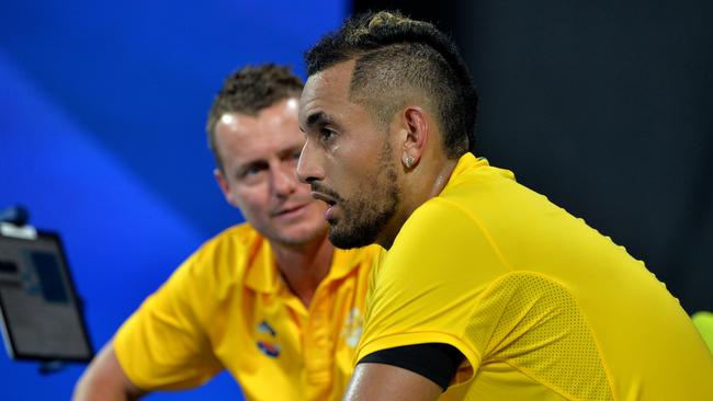 Lleyton Hewitt (L) has become a mentor to Kyrgios. Picture: Getty