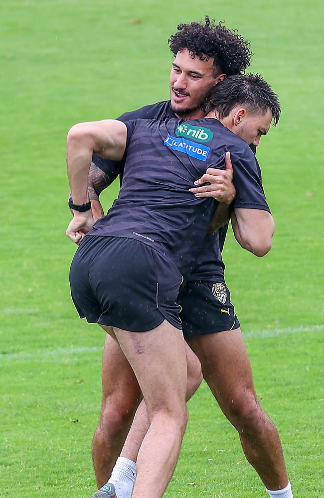 Mykelti Lefau tackle Josh Gibcus at Richmond training. Picture: Ian Currie