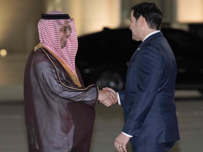 Farid Al-Shehri, director-general of the Saudi Ministry of Foreign Affairs Jeddah branch, greets US Secretary of State Marco Rubio upon his arrival at King Abdulaziz International Airport in Jeddah. Picture: AFP