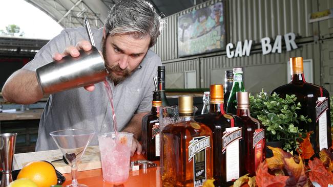 Cocktail connoisseur Fiona McConnell and mixologist Brady Hixson prepare for the cocktail festival at NightQuarter in Helensvale. Photo: Tertius Pickard