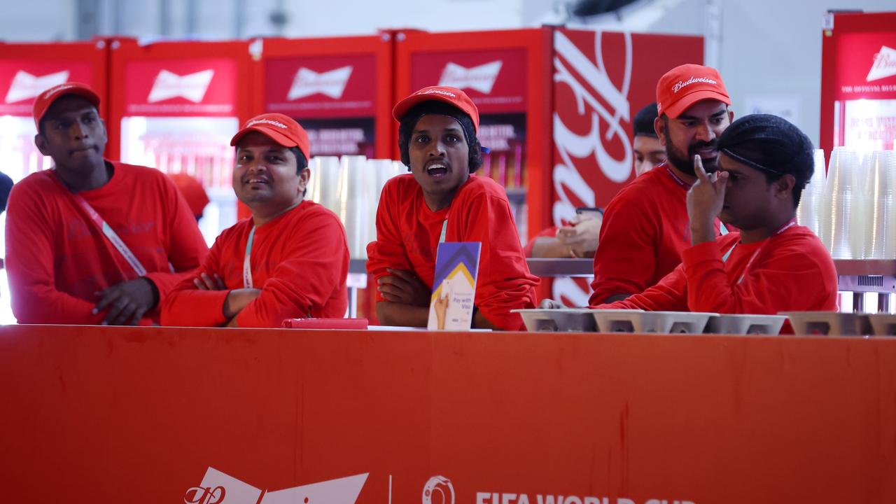 Bar staffs wait for the beer stand to be opened at the fan festival on day 2 of the FIFA World Cup 2022 Qatar Fan Festival at Al Bidda Park on November 20, 2022 in Doha, Qatar. (Photo by Alex Grimm/Getty Images)