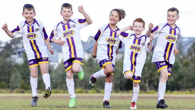 Glenmore Park’s Kyle Klaassen, 8, Bailey Blowers, 8, Seth Ranieri, 8, Xavier Mobbs, 7, and Zac Collins, 7 do the “pony” goal celebration. Picture: Justin Lloyd.