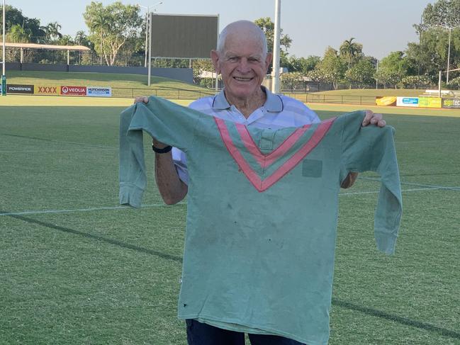 Ian Snow Davis holding his jersey from the 1960 game between the NT and France