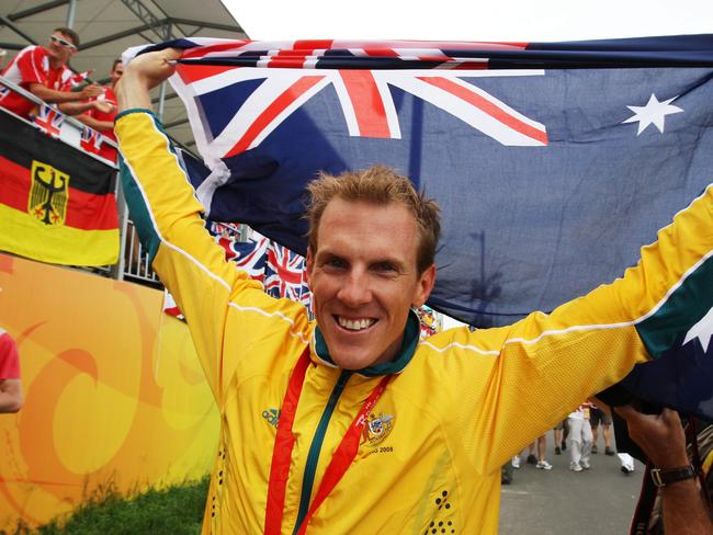 Kayaker Ken Wallace wins gold in the K1 singles 500m at the 2008 Beijing Olympics.