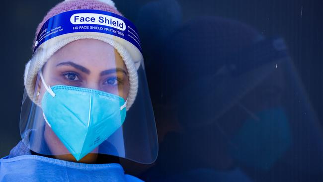 A nurse poses for a photo while working at the Coogee Covid-19 testing site. Picture: NCA Newswire /Gaye Gerard