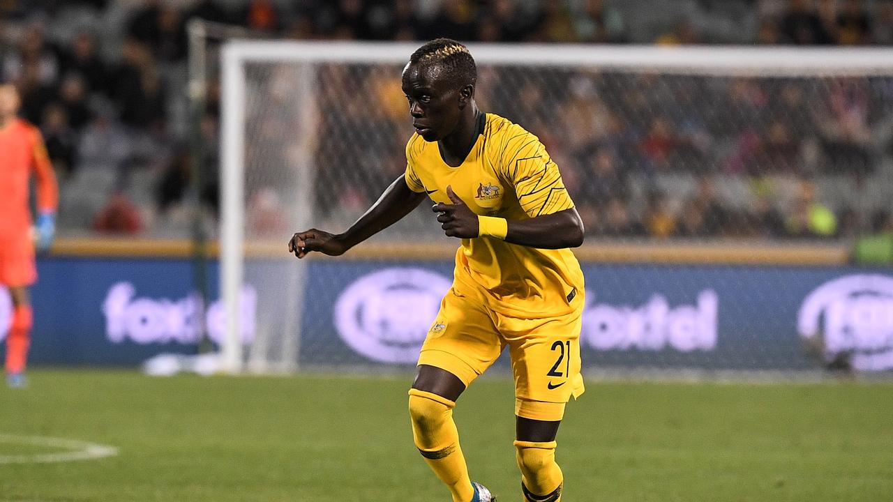 Awer Mabil and his Socceroos teammates won’t be going to Nepal later this month. Picture: AAP Image/James Gourley