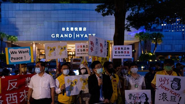 Demonstrators take part in a protest against Speaker of the House Nancy Pelosi's visit to Taiwan in August. Pelosi arrived in Taiwan as part of a tour of Asia aimed at reassuring allies in the region.