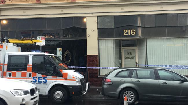 Police tape remains around the bar on Glen Huntly Rd in Elsternwick, after a man died in police custody. Picture: Chanel Zagon