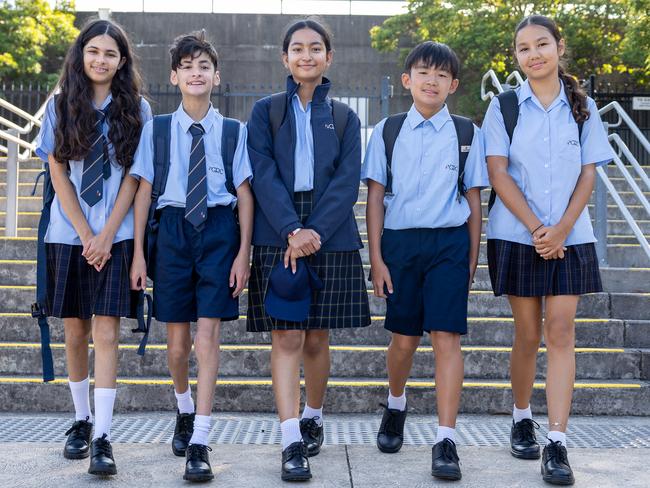 The first day of high school for Ellie Jhinku, Nicholas Jhinku, Luniva Diwal, Noah Cato and Kayla Burton was also the first day of a new era for their school, Georges River College Hurstville Campus. Picture: Thomas Lisson