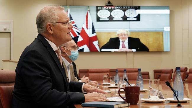 Scott Morrison holding a teleconference with UK Prime Minster Boris Johnson at Parliament House. Picture: Adam Taylor