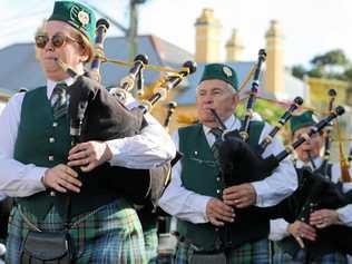 SWEET SOUNDS: River Street, Maclean fills with the sound of pipes and drums. Picture: Jenna Thompson