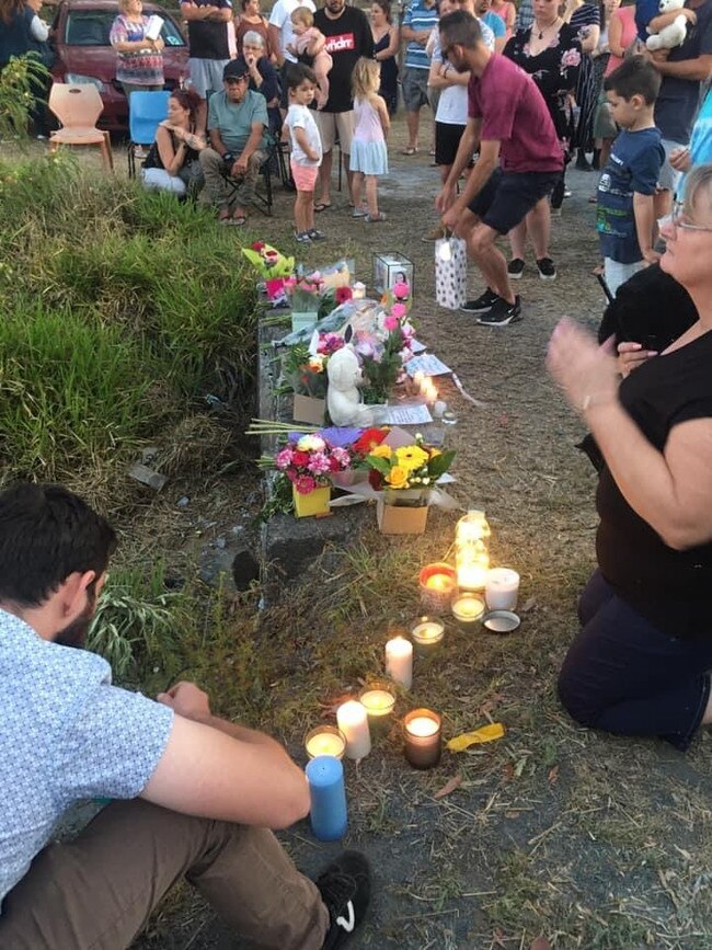 Mourners at the crash site.