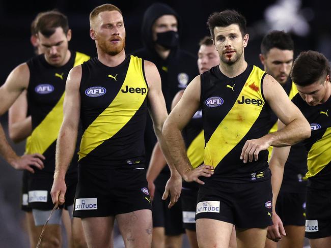 Gold Coast Suns vs Richmond at Marvel Stadium, Melbourne. 01/07/2021.  A bloodied Trent Cotchin leads his team off Marvel Stadium after losing to the Gold Coast Suns   .  Pic: Michael Klein