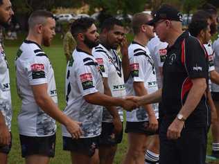 Governor General David Hurley shakes hands with the Bellingen Dorrigo Magpies prior to kick off against the Australian Army Thunder in the Sgt. Matthew Locke Memorial match at Bellingen. Picture: Matt Deans