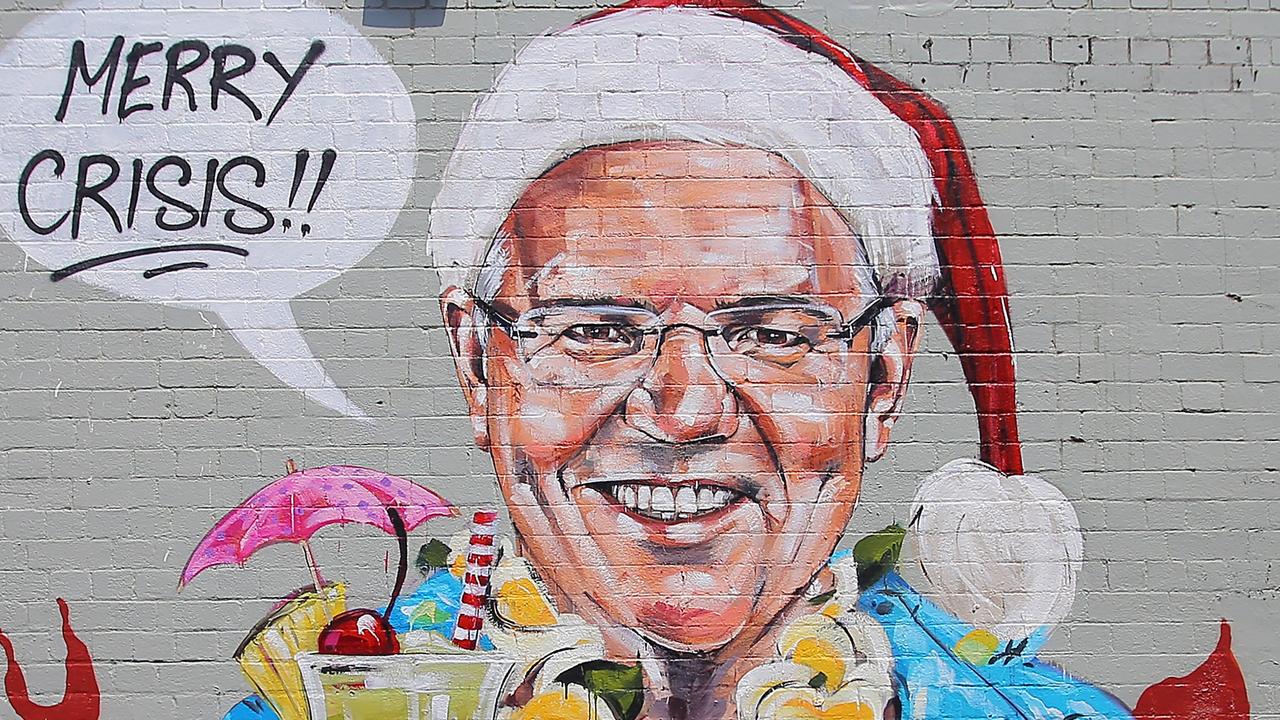 A mural depicting Prime Minister Scott Morrison wearing an unbuttoned Hawaiian shirt, orange lei and Santa Claus hat while holding a cocktail by artist Scott Marsh on a wall in Sydney.